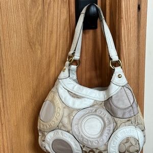 Coach pierced patchwork signature bag.